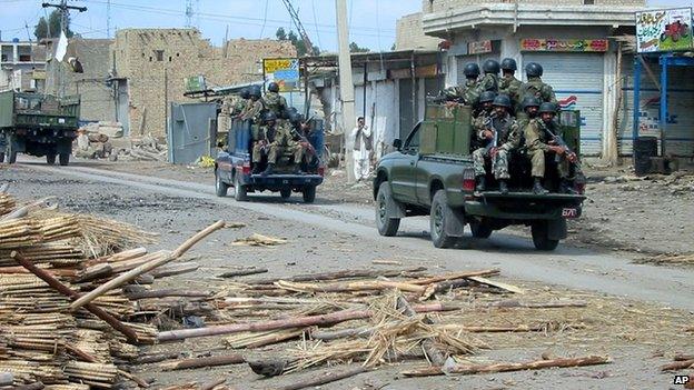 Troops of Pakistan army patrol in a militant area of Miramshah in North Waziristan, in 2006.