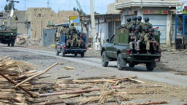 Troops of Pakistan army patrol in a militant area of Miramshah in North Waziristan, in 2006.