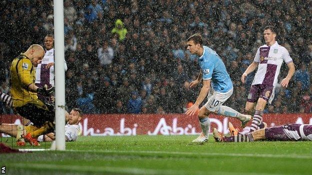 Edin Dzeko gives Manchester City the lead