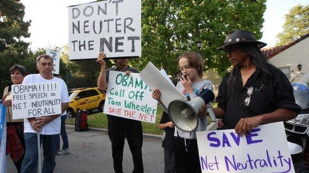 Protesters in Los Angeles with banners calling for net neutrality to be enshrined