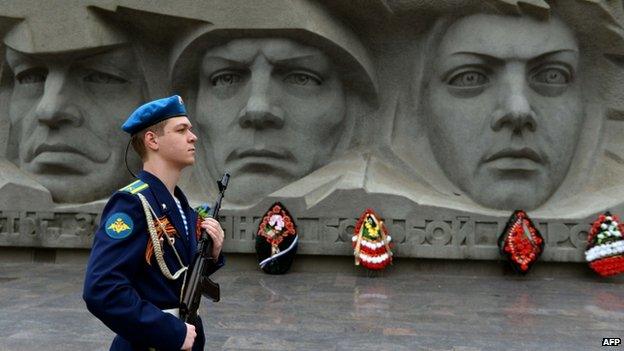 An honour guard stands at attention near a World War II monument in the southern Russian city of Stavropol