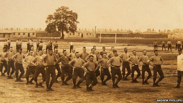 Barrack huts at Colchester Garrison with soldiers training on the Abbey fields