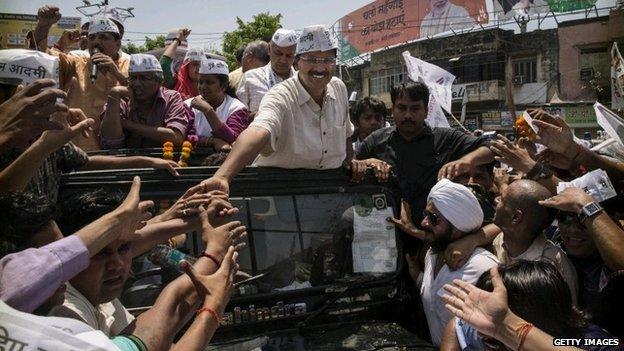 Arvind Kejriwal greets supporters in Varanasi