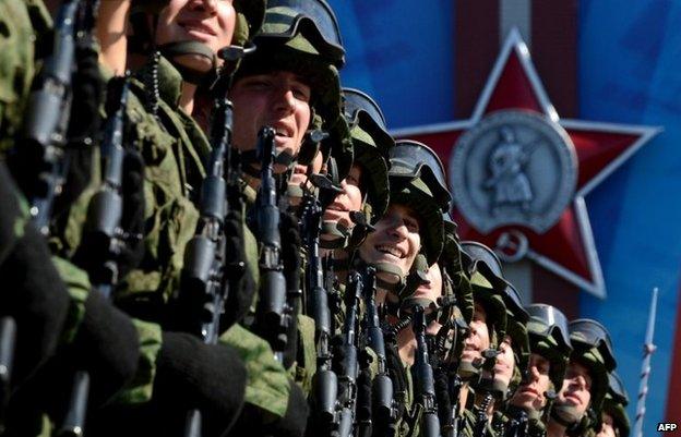 Russian soldiers march at the Red Square in Moscow, on May 9