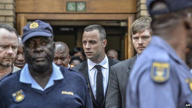 Oscar Pistorius leaves the courtroom in Pretoria - 5 May 2014