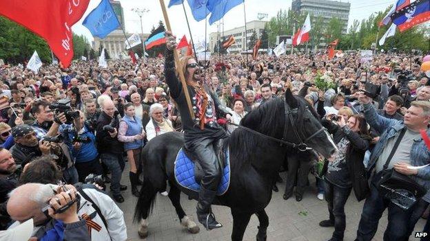 A pro-Russia activist marks the anniversary in the eastern city of Donetsk, 9 May