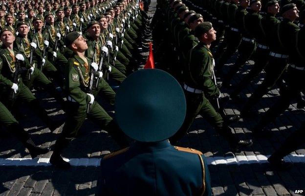 Russian soldiers march at the Red Square in Moscow, on May 9