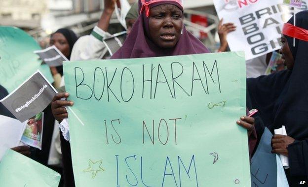 A woman attends a demonstration calling on the government to increase efforts to rescue more than 200 kidnapped schoolgirls in Lagos, Nigeria - Monday 5 May 2014