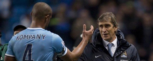 Vincent Kompany and Manuel Pellegrini