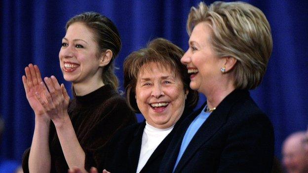 Hillary Clinton and her mother and daughter smile at an Iowa event in January 2008.