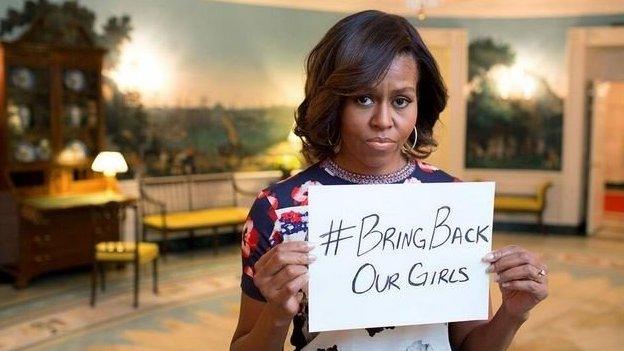 Michelle Obama with sign "#BringBackOurGirls"