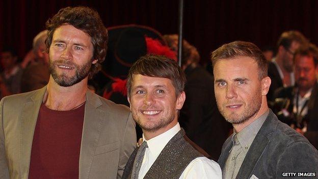 (l-r) Howard Donald, Mark Owen and Gary Barlow at a London film premiere in 2011