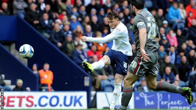 Preston North End's Joe Garner scores the equaliser against Rotherham