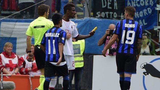 AC Milan defender Kevin Constant picks up banana