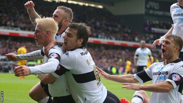 Will Hughes celebrates