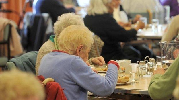 Old people eating a meal