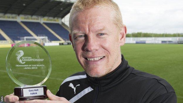 Gary Holt with his award