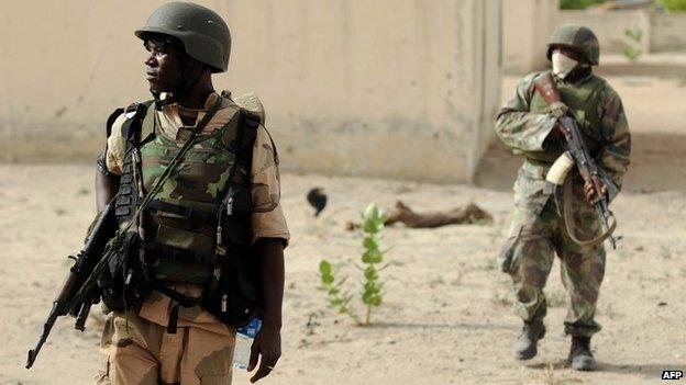 Nigerian soldiers on patrol in the north of Borno state - 5 June 2013