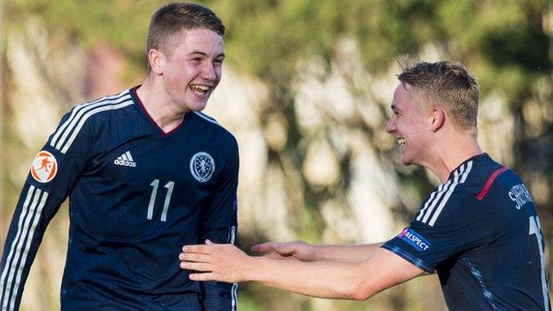 Scott Wright (left) celebrates for Scotland