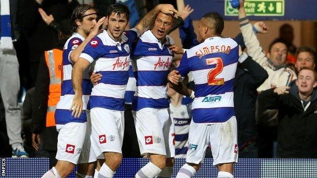 QPR celebrate a Charlie Austin goal