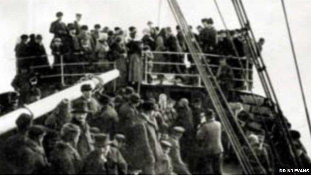 Migrants onboard a ship