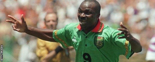 Roger Milla celebrates scoring for Cameroon in 1994