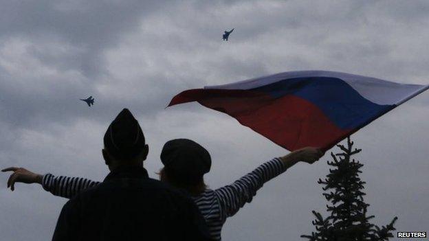 Woman waving a Russian flag