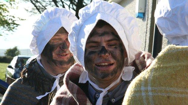 People dressed as rioters for the anniversary celebrations