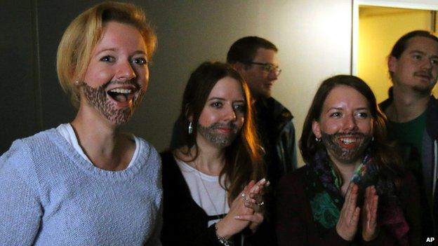 Supporters of Conchita Wurst watch Eurovision in Vienna, Austria, on 10 May 2014