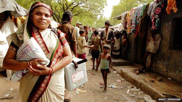 Sita Devi outside a market stall