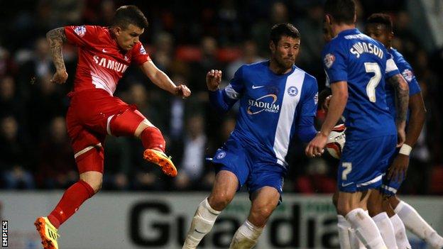 Dean Cox scores against Peterborough