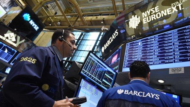 Traders working on the floor of the New York Stock Exchange