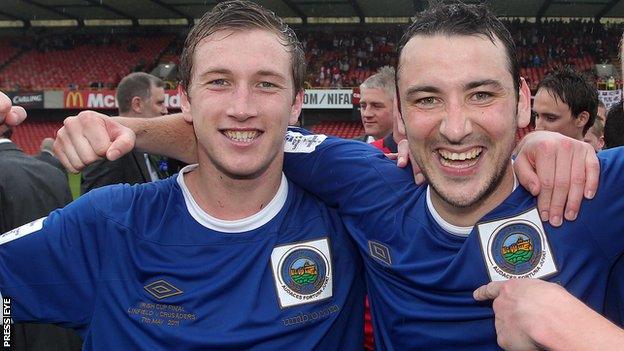 Mark McAllister and Michael Gault celebrate winning the Irish Cup with Linfield in 2011