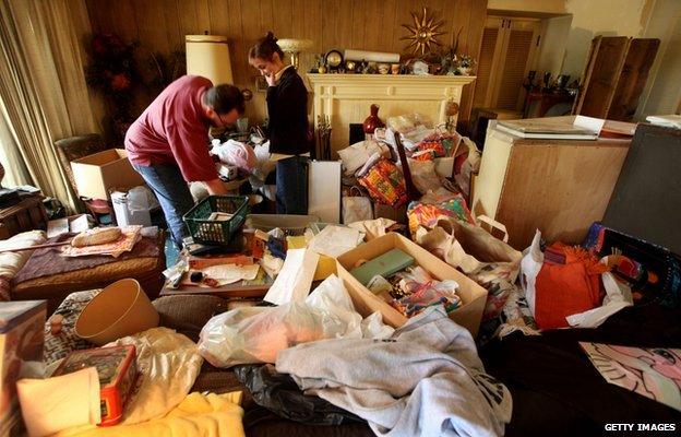 Greg Martin clears his mother's home in 2011, in San Diego, California, after she died