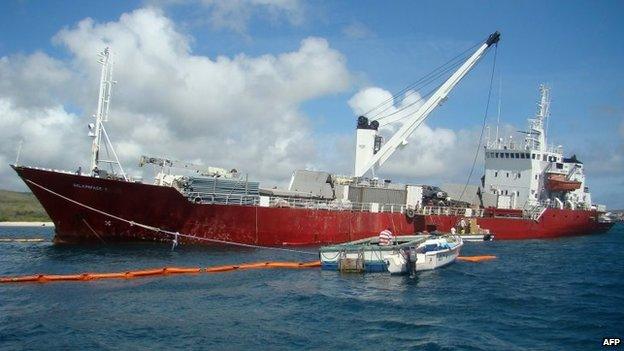 Picture taken on May 13, 2014 showing an Ecuadoran freighter which ran aground on May 9, 2014, in the Galapagos islands.