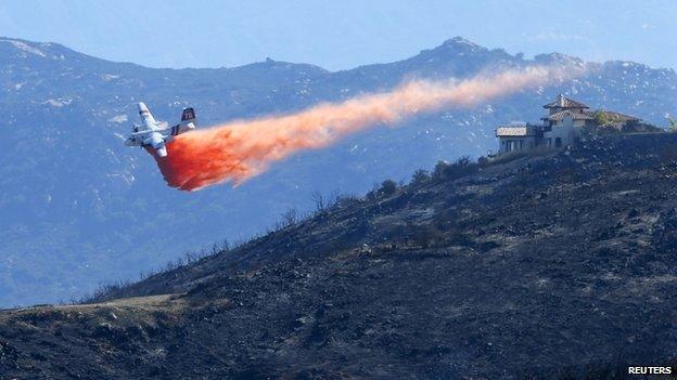 A water bomber made a drop in San Marcos California, on 15 May 2014