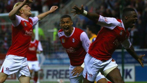 Rotherham players celebrate Kieran Agard's goal