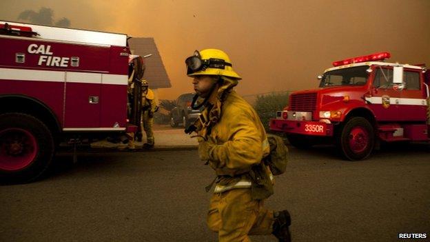 Firefighters battled the Cocos Fire in San Marcos, California, on 15 May 2014