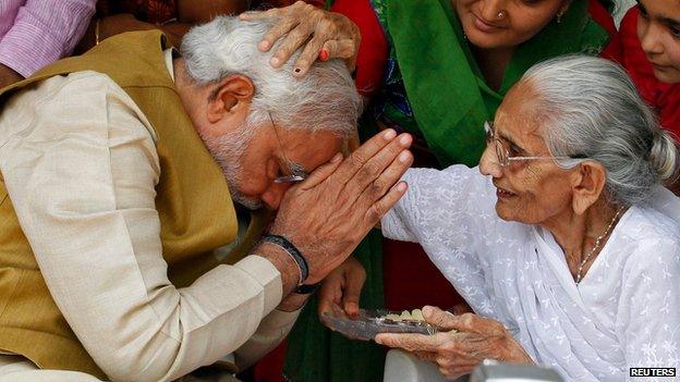 Narendra Modi with his mother in Gandhinagar on 16 May 2014