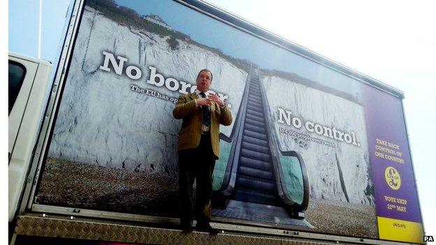 Nigel Farage launching a campaign poster last month