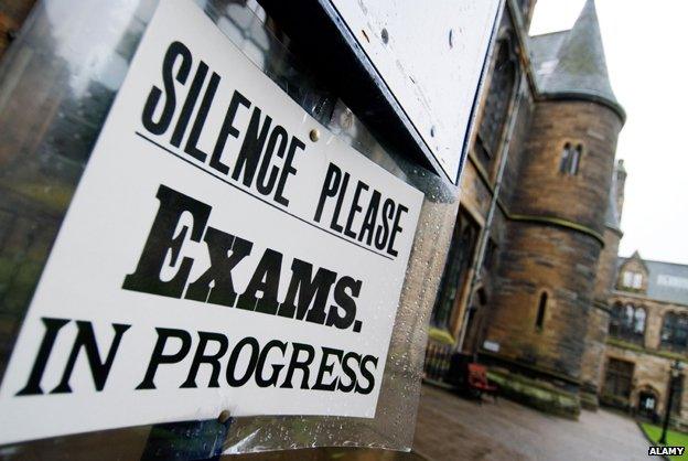 Board outside Glasgow University reads: "Silence please, exams in progress"