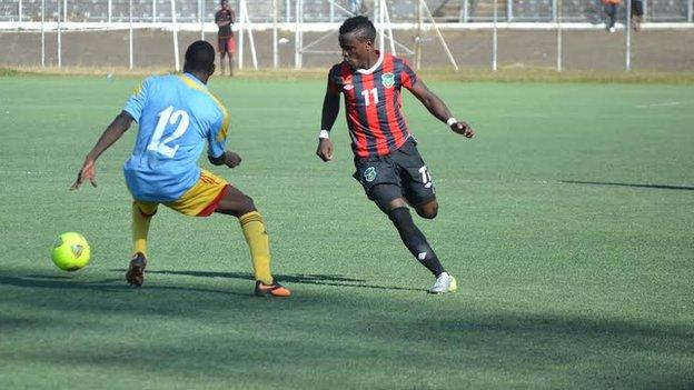 Malawi's Frank 'Gabadinho' Mhango (number 11)