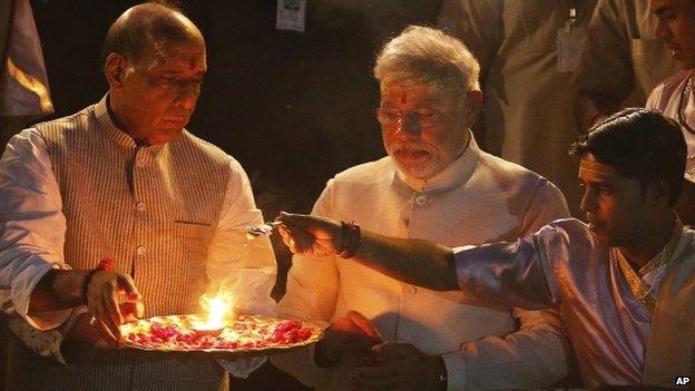 Mr Modi performs a religious ritual in Varanasi