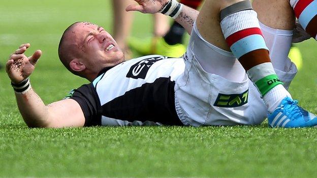 Harlequins' Mike Brown in pain following his injury