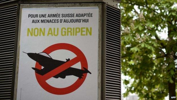 A campaign poster against the Swedish fighter jet Gripen is seen in Geneva (7 May 2014)