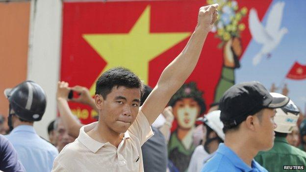 A protester gestures as he marches during an anti-China protest in Vietnam's southern Ho Chi Minh City on 18 May 2014