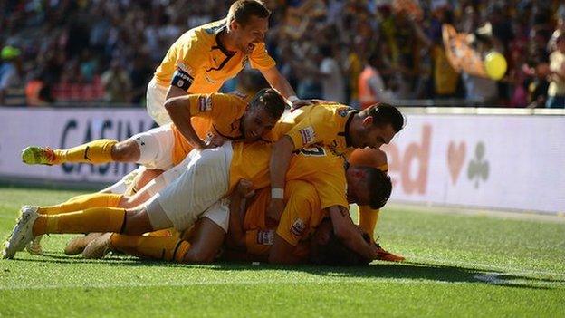 Cambridge United celebrate scoring against Gateshead