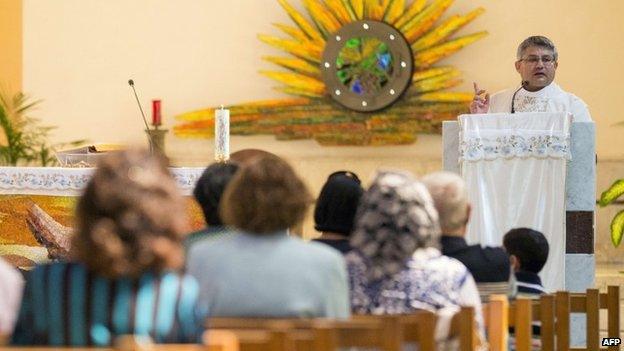 Mass is celebrated at the St Joseph's church in the Israeli coastal city of Haifa (18 May 2014)