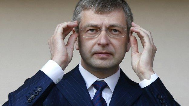 Dmitri Rybolovlev adjusts his glasses at an AS Monaco match against Caen - 4 May 2013