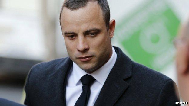 Olympic and Paralympic track star Oscar Pistorius arrives at the court